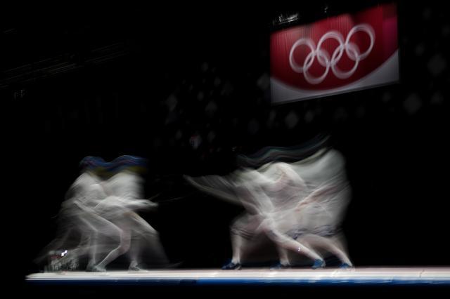 足球直播-日媒：菅义伟不考虑取消奥运 男重团体金牌“悲愿”